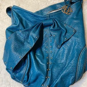 Teal blue studded hobo bag